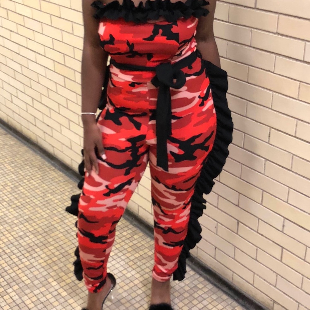 A red strapless jumpsuit